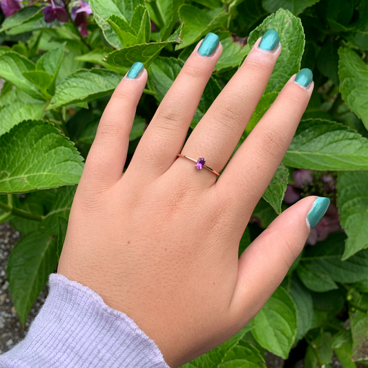 14k yellow gold oval-cut amethyst solitaire ring with minimalist gold band, February birthstone jewelry